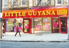  ??  ?? The Bake Shop on Liberty Avenue sells addictive sweets.The Little Guyana strip of Queens, New York, runs from 104th to 130th Street. — WP-Bloomberg photos