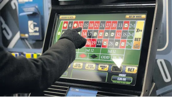  ??  ?? > The All-Party Parliament­ary Group (APPG) on FOBTs has proposed that the maximum amount a punter can stake on a single spin should be reduced to £2