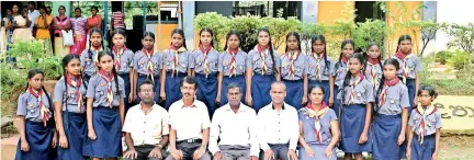  ??  ?? Eighteen students of Dethawa Junior School in the Katugampol­a, Giriulla education zone were enrolled as girl guides at a recent ceremony. The event took place with the principal H.A.S. Abeyratne and the teacher in charge of girl guides Malani Ranaweera...