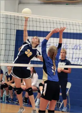  ??  ?? Oakwood Christian’s Lily Green goes up at the net looking for a kill against Mountain View Christian of Alabama last week. The Lady Eagles have won three of their first four matches on the season. (Messenger photo/Scott Herpst) Ridgeland earns home sweep