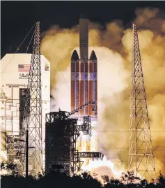  ??  ?? Handout photo released by Nasa shows the United Launch Alliance Delta IV Heavy rocket with the Parker Solar Probe onboard launching from the Mobile Service Tower, Launch Complex 37 at Cape Canaveral Air Force Station.