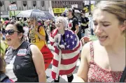  ?? JOHN MINCHILLO / AP ?? Protesters yell during a demonstrat­ion in downtown Philadelph­ia on Sunday. The city’s police commission­er said the protests were peaceful.