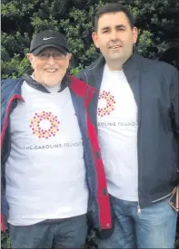  ??  ?? Mark Kinsella with Dermod Dwyer, Caroline’s dad, at the Caroline Foundation ribbon world record attempt.