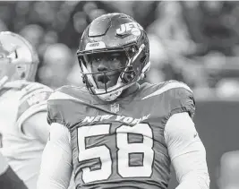  ?? ED MULHOLLAND USA TODAY NETWORK ?? Defensive end Carl Lawson had seven sacks for the Jets in 2022, but played just 101 defensive snaps in six games for New York last season.