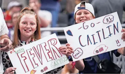  ?? GRACE HOLLARS/USA TODAY SPORTS ?? Indiana Fever fans eagerly await Caitlin Clark taking the court during a preseason game last week. Clark’s first WNBA regular-season game is on Tuesday night.