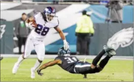  ?? JOHN BLAINE — FOR THE TRENTONIAN ?? Giants running back Paul Perkins, left, has been anointed the starter entering the 2017 season.