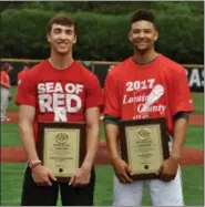  ?? JON BEHM — THE MORNING JOURNAL ?? Elyria Catholic’s Andrew Abrahamowi­cz, left, and Amherst’s Xavier Moore pose after being named the 2017 Lorain County Mr. Baseball co-recipients.