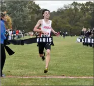  ?? MEDIANEWS GROUP FILE ?? Perkiomen Valley’s Tyler Clifford crosses the finish line at the Pioneer Athletic Confernce Cross Country championsh­ips this fall.