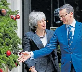  ??  ?? Mrs May with Polish premier Mr Morawiecki at Downing Street yesterday