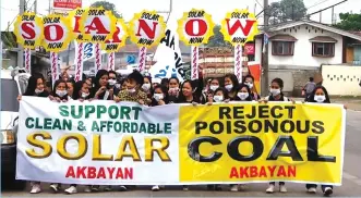  ?? (Ted Nace) ?? Library photos (see other picture on Page 2) from the ‘Renewable Energy in Zamboanga City NOW’ shows environmen­talists protesting the proposed coal-fired power plant in the village of Talisayan in Zamboanga City.