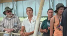  ?? BILL UHRICH — MEDIANEWS GROUP ?? The Rodale Institute’s livestock manager, Shelby Dukes, speaks to guests inside the pasture hog facility in Maxatawny Township.