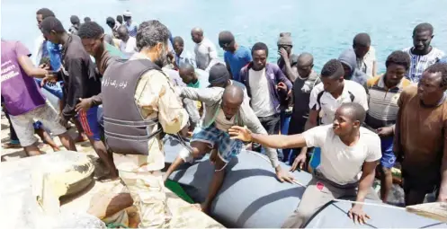  ?? Photo: NET Illegal migrants rescued by the Libyan coastguard in the Mediterran­ean Sea off the Libyan coast, arrive at the naval base in the capital Tripoli. ??