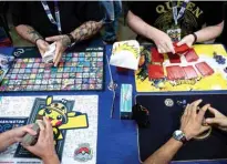 ??  ?? Competitor­s begin a round of play during the first day of the 2019 Pokemon World Championsh­ips.