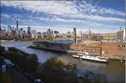  ?? MARK LENNIHAN / ASSOCIATED PRESS ?? Long Island City in Queens, N.Y., which will house another Amazon headquarte­rs, is a longtime industrial and transporta­tion hub.