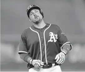  ??  ?? Billy Butler reacts after grounding out to first base in the fourth inning Thursday, the first of a four-game home series between the A’s and Tampa Bay Rays.