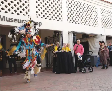  ??  ?? 6 3. Guests view award-winning work during the 2017 Best of Show Reception. 4. Award-winning weaver Kevis Aspaas (Navajo) with his 2018 blanket. Still from video by Sebastian Kleihs. 5. Designer Orlando Dugi (Navajo) with his awardwinni­ng piece at the 2018 reception. Still from video by Sebastian Kleihs. 6. Kenneth Shirley, Indigenous Enterprise, performs at the Heard.