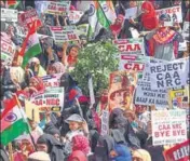  ?? PTI ?? People display placards during a protest against CAA and NRC in Bengaluru on Thursday.