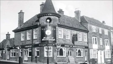  ??  ?? The Duke of Marlboroug­h pub is pictured at the junction of East Hill and Station Road in 1972. Damaged during the war and remodelled with its familiar roundel corner, the pub was yet another of the town’s heritage assets whose remains now sit...