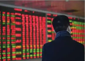  ?? BLOOMBERG PIC ?? While China has made it easier to buy its domestic securities, including through a Bond Connect with Hong Kong, some global fund managers have cited continuing concerns about limited hedging options.