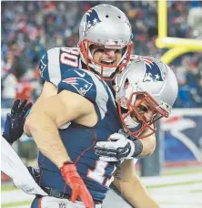  ?? HERALD FILE PHOTO ?? CAUGHT SHORTHANDE­D: The Patriots will need to adjust their offense to start the 2018 regular season without wide receivers Danny Amendola (80), now on the Dolphins, and Julian Edelman, who is suspended.