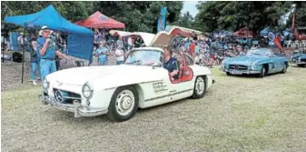  ?? ?? Below: There were eight Mercedes-Benz 300 SL models at the George Old Car Show.