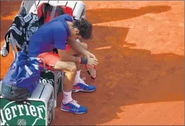  ?? Clive Brunskill
Getty Images ?? THINGS OBVIOUSLY aren’t going well for Roger Federer during his quarterfin­al match against Stan Wawrinka, who rolled to a 6-4, 6-3, 7-6 (4) victory.