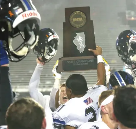  ?? ALLEN CUNNINGHAM/SUN-TIMES ?? Lincoln-Way East defeated Warren to win the Class 8A football title on Nov. 30, 2019, in DeKalb.