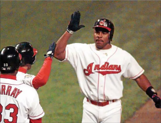  ?? ASSOCIATED PRESS FILE ?? Albert Belle is congratula­ted by Omar Vizquel and Eddie Murray after hitting a home run in the 1995 World Series.