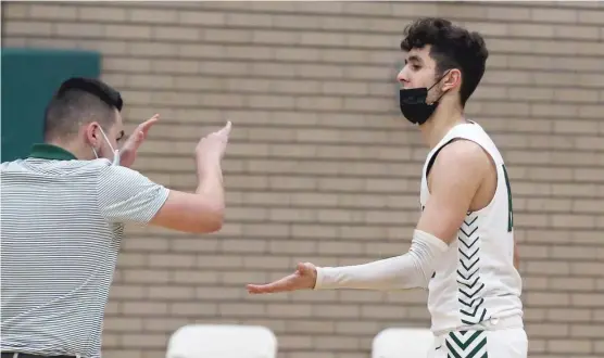  ?? ALLEN CUNNINGHAM/SUN-TIMES ?? St. Patrick senior Nick Galati scored nine points in overtime and finished with a game-high 23 points against Lake Forest.