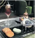  ??  ?? The $1,000 Mister C cocktail comes with foie gras terrine, Osetra caviar and potato pancakes.