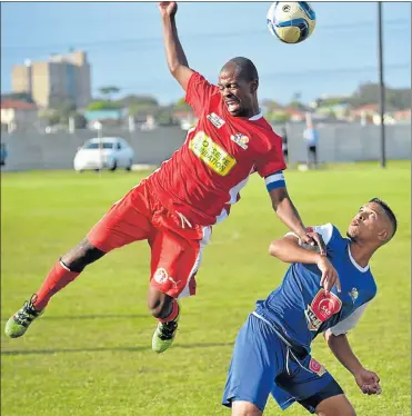  ?? Picture: EUGENE COETZEE ?? RISING TO THE OCCASION: Lion City’s Luxolo Tobi, left, and Callies’ Verrnan Campher in action during their ABC Motsepe League match