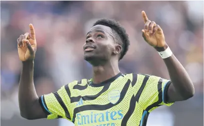  ?? Picture: Getty Images ?? ON THE DOUBLE. Arsenal’s Bukayo Saka celebrates after scoring a goal during their Englsih Premier League match against West Ham United at London Stadium yesterday.