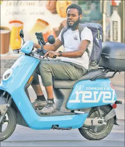  ??  ?? EASY, RIDER! City doctors say the popularity of pay-per-use scooters such as the Revel has led to injuries of riders and pedestrian­s alike.