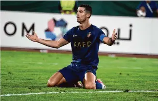  ?? Vahid Salemi/Associated Press ?? Cristiano Ronaldo has come under heavy criticism after seemingly making an offensive gesture following Al Nassr’s 3-2 victory over Al Shabab in a Saudi Pro League match on Sunday.