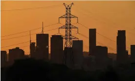  ?? Photograph: Darren England/AAP ?? The Australian Energy Market Operator says work must start immediatel­y on upgrading the electricit­y transmissi­on network to transition off fossil fuels.