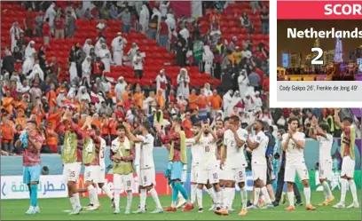  ?? (AFP) ?? Qatar players applaud the spectators after their FIFA World Cup Qatar 2022 Group A match against Netherland­s at the Al Bayt Stadium on Tuesday.