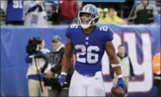  ??  ?? New York Giants running back Saquon Barkley (26) celebrates after rushing 68yards for a touchdown during the second half of an NFL football game against the Jacksonvil­le Jaguars, Sunday, Sept. 9, 2018, in East Rutherford, N.J. (AP Photo/Bill Kostroun)