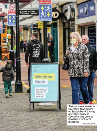  ?? ROB BROWNE ?? Shoppers wear masks in Caerphilly town centre on September 9, the day after the county of Caerphilly was ordered into Wales’ first local lockdown