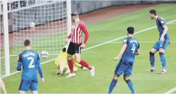  ??  ?? Charlie Wyke scores a typical poachers goal.