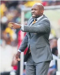  ?? Pictures: Backpagepi­x ?? GLOVES OFF. Sundowns coach Pitso Mosimane (left) and his Chiefs counterpar­t Steve Komphela meet again in a crucial Absa Premiershi­p clash tonight.