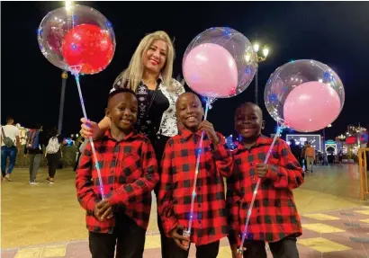  ?? ?? Talented children from Masaka Kids Africana enjoy their stay in Dubai while regaling audiences at the Global Village with their dance moves.