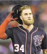  ?? AP & GETTY ?? Bryce Harper and Manny Machado, two of baseball’s biggest stars, have yet to sign new deals.