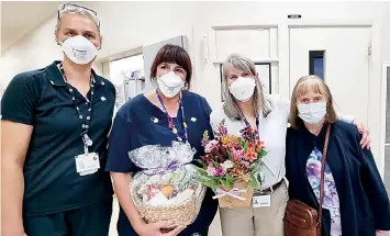  ?? ?? Left: West Gippsland Hospital’s registered nurses Kylie Mullen and Tracey Beggs, with comprehens­ive care social worker Caroline Clark and Jillian Amor. Jillian and her family presented a gift basket and flowers to those who supported them and John while he was in palliative care.