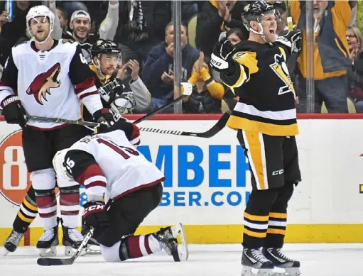  ?? Peter Diana/Post-Gazette ?? Patric Hornqvist, celebratin­g a goal against the Coyotes this month, practiced Friday for the first time since suffering a concussion a week ago in Boston.