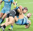  ??  ?? Big hit: Exeter’s Joe Simmonds is tackled by Castres winger Florian Vialelle