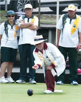  ??  ?? Drouin’s Ian McCartney draws a crowd of onlookers whilst bowling against Warragul in division one on Saturday. His team won 33/13 to help Drouin to the overall victory.