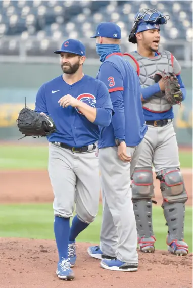  ?? GETTY IMAGES ?? Tyler Chatwood leaves the mound in the third inning Thursday against the Royals at Kauffman Stadium.