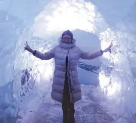  ??  ?? Nila Layug of Icelandair / Royal Nordic experience­s the interior of a glacier at the Perlan Museum in Reykjavik.