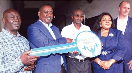  ?? Sunday adigun ?? L-R: Head Coach, Nigerian Paralympic­s Powerlifti­ng Team, Mr. Feyisetan Are; Managing Director, FrieslandC­ampina WAMCO Nigeria Plc. Mr. Ben Langat; Director and Head of Lagos Liaising Office, Federal Ministry of Youth and Sport, Dr. Segun Akinlotan;...