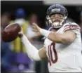  ?? JIM MONE — THE ASSOCIATED PRESS ?? Bears quarterbac­k Mitchell Trubisky warms up before facing the Vikings on Dec. 30.
